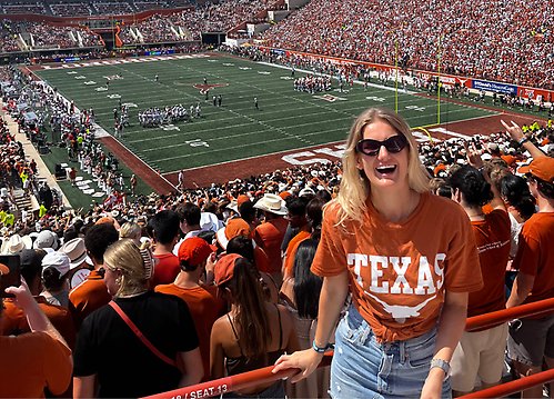 A picture of a female student at a football game in Texas, USA.