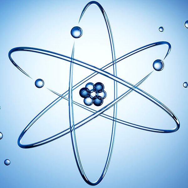 Atomkärna med elektroner mot en blå bakgrund.