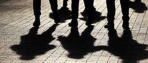 Shadows from people walking.