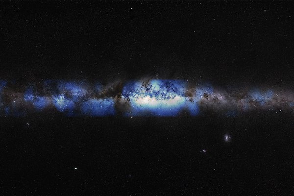 An image showing the Milky Way depicted after locating neutrinos. Looks like a space image with a blue glowing line in the middle.