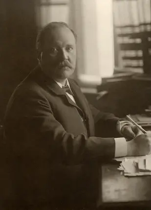 Svante Arrhenius at his desk.